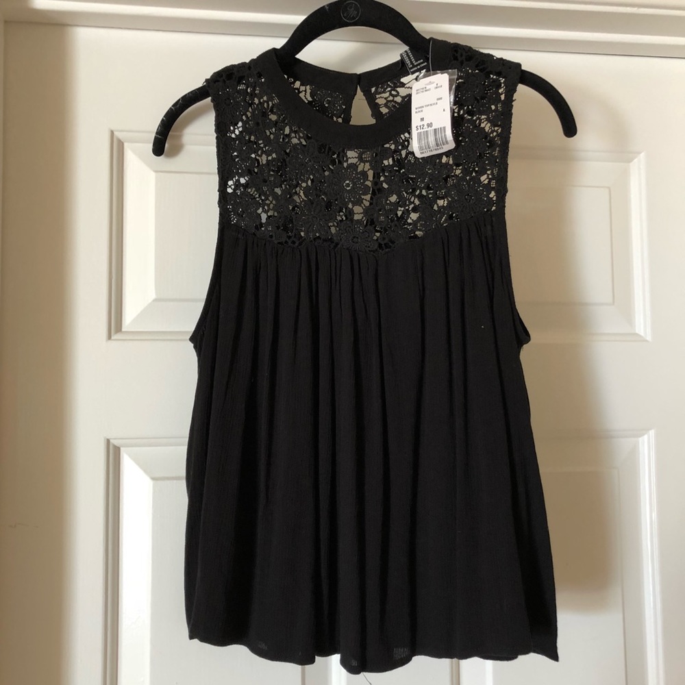 NWT Black sleeveless with lace swing top.